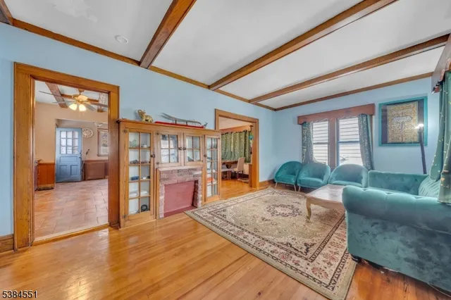 a living room with furniture and a table