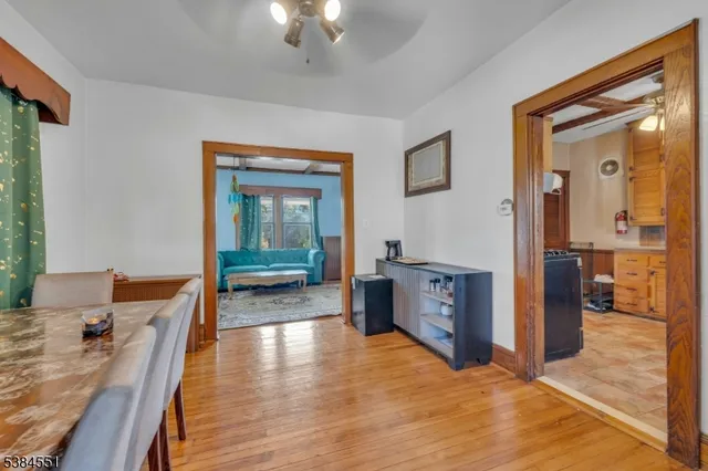 a view of a kitchen from the hallway