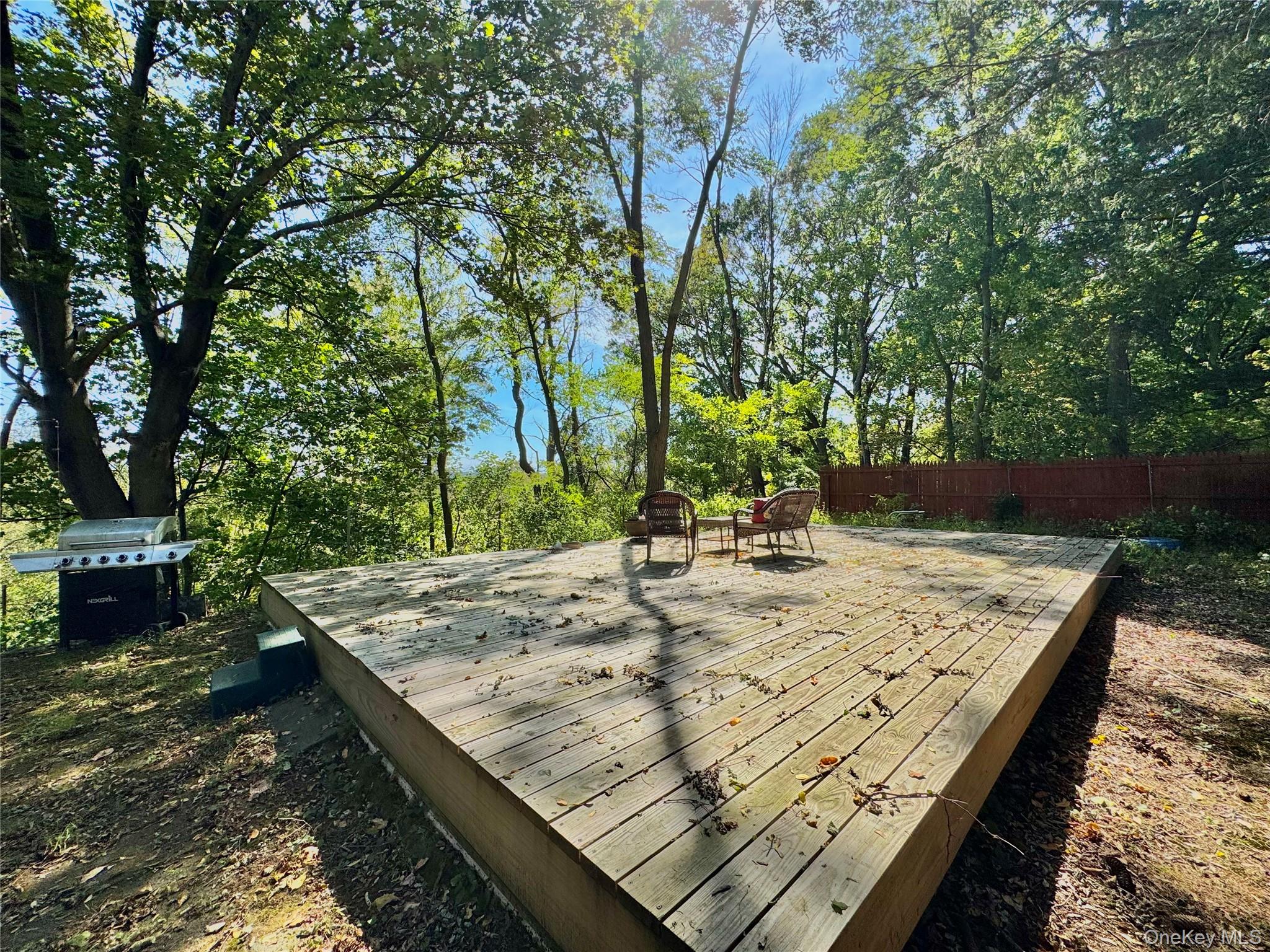 214 County Route 67 Cairo, NY 12413 - Photo 18 of 21 a view of a backyard with sitting area