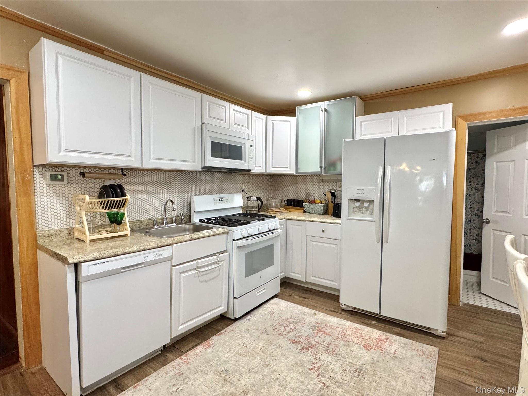 214 County Route 67 Cairo, NY 12413 - Photo 7 of 21 a kitchen with stainless steel appliances granite countertop a refrigerator sink and cabinets