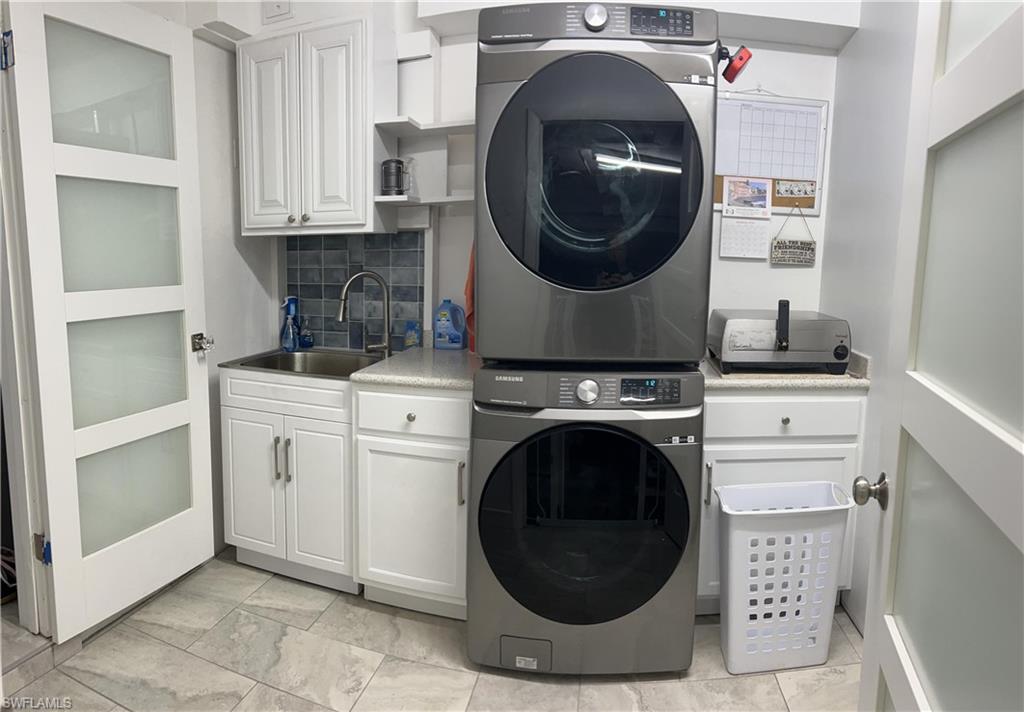 13511 Island Road Fort Myers, FL 33905 - Photo 31 of 38 a utility room with dryer and washer