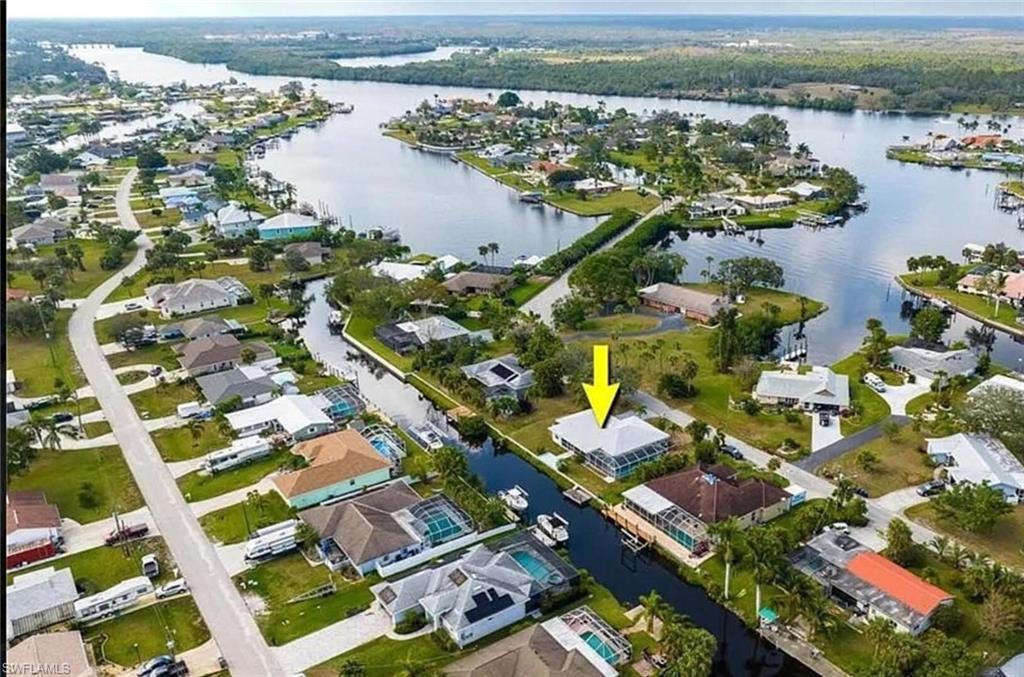 13511 Island Road Fort Myers, FL 33905 - Photo 4 of 38 a view of a city with lake