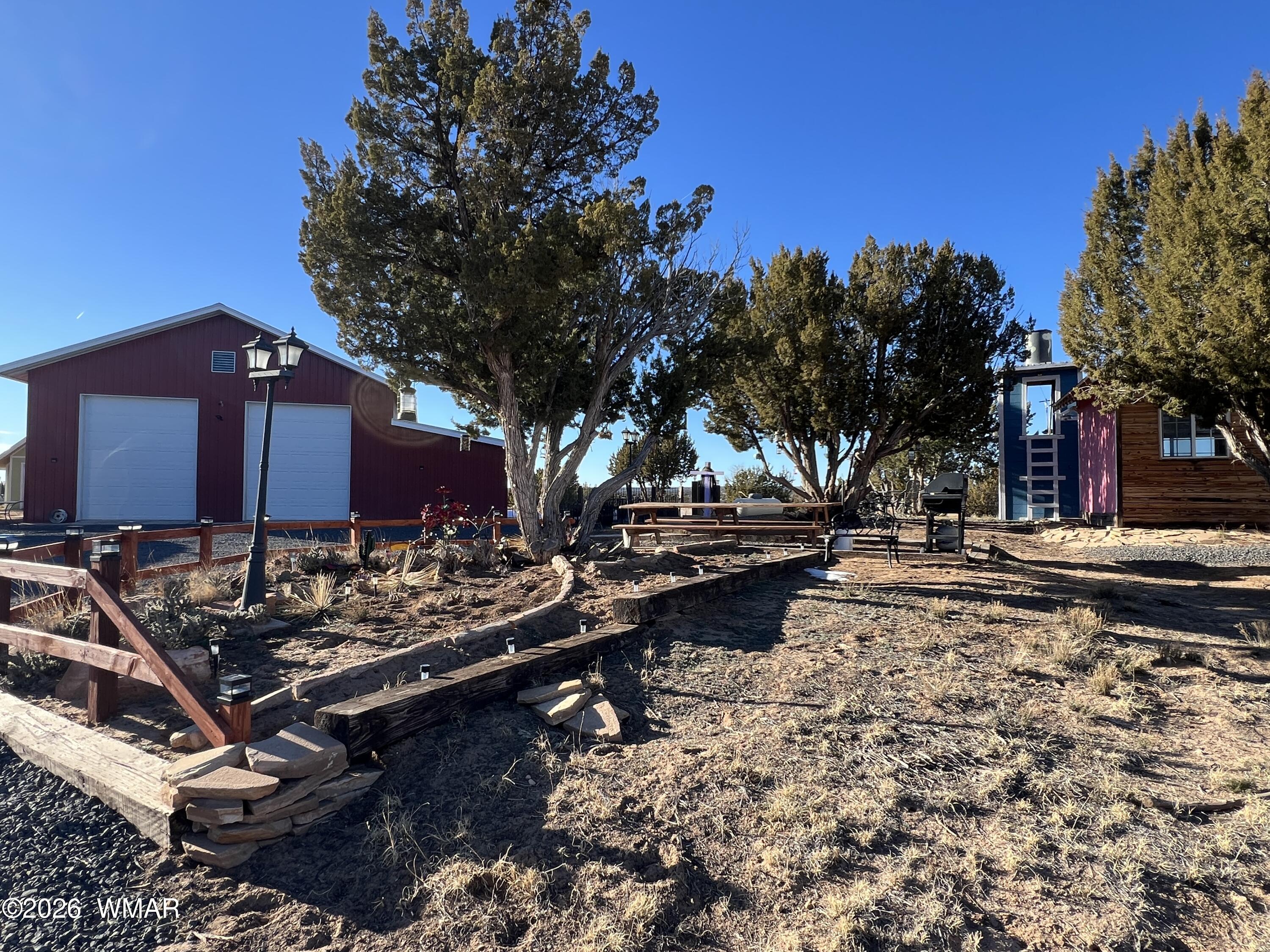 25 North County Road St. Johns, AZ 85936 - Photo 45 of 55 a view of a yard with chairs