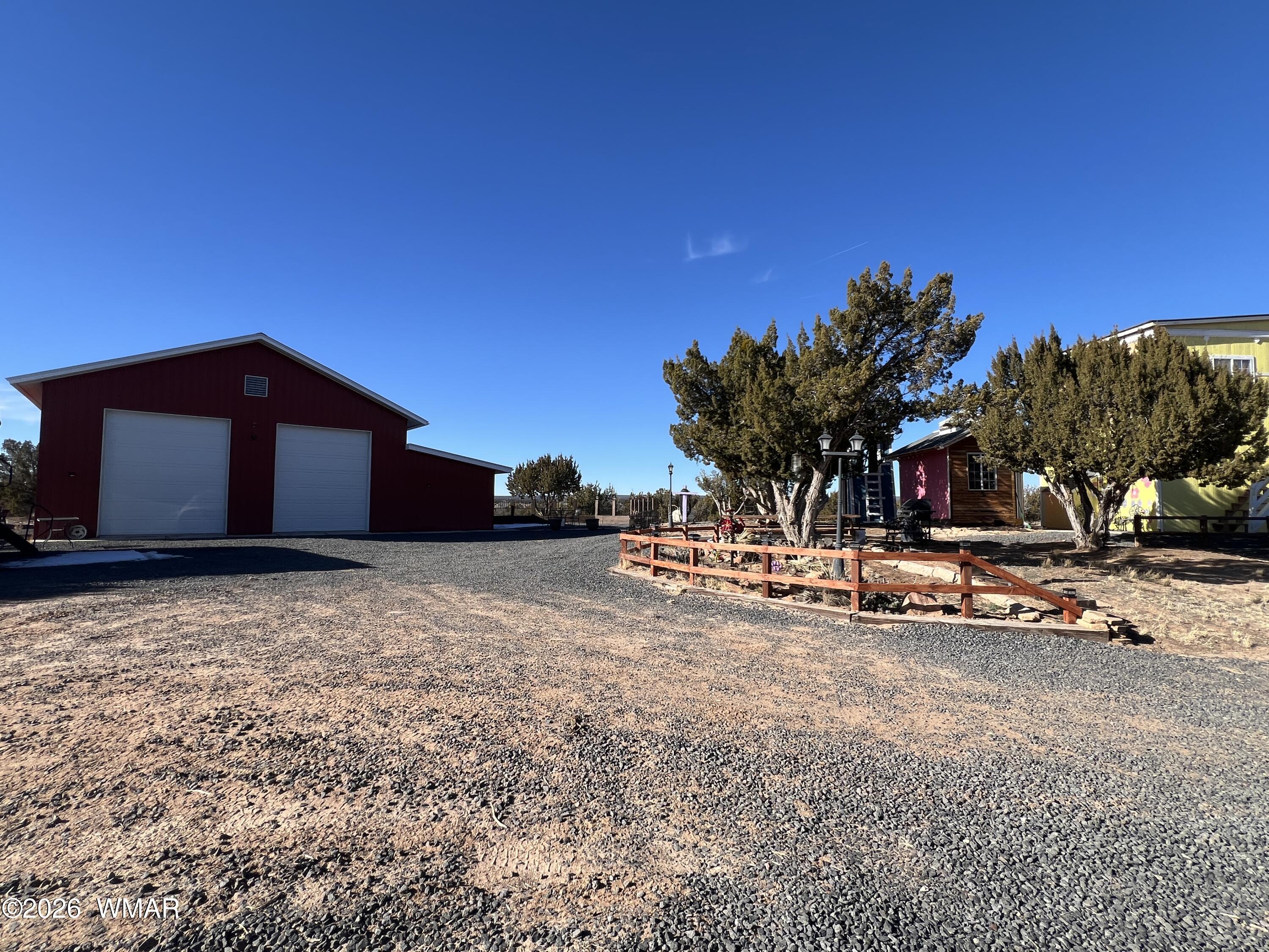 25 North County Road St. Johns, AZ 85936 - Photo 6 of 55 a view of a house with a yard