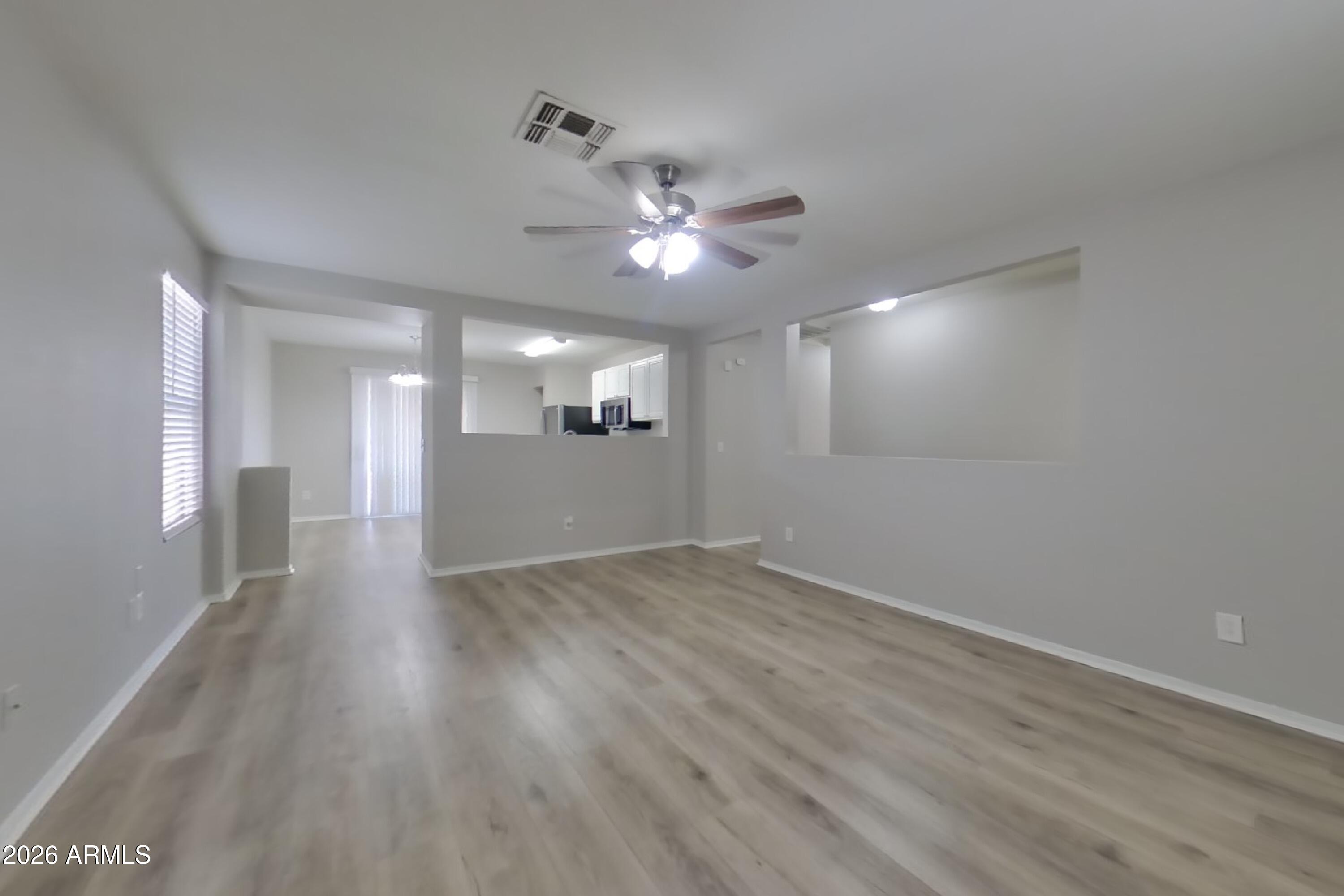 11514 West Wethersfield Road El Mirage, AZ 85335 - Photo 5 of 28 3_Image_LI5NtaXqDS