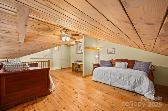 a view of a livingroom with fireplace and furniture