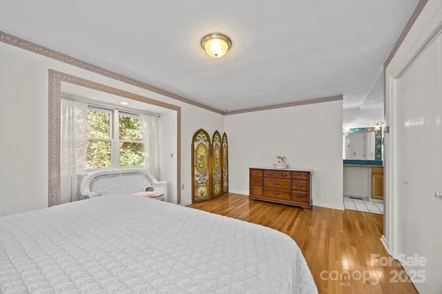 a bathroom with a sink a mirror and a shower