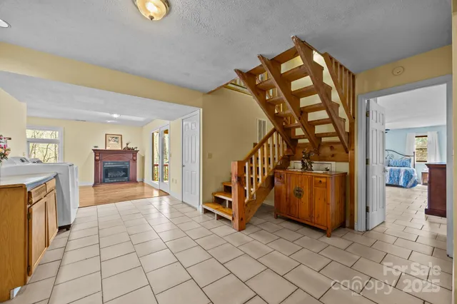 a view of a living room and a wooden floor