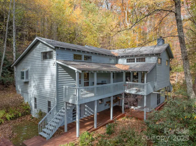 a view of a balcony with wooden floor