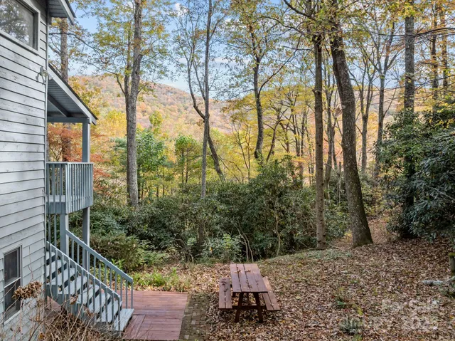a view of balcony with wooden floor