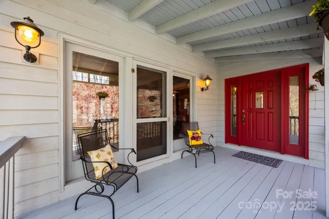 a view of a hallway with windows