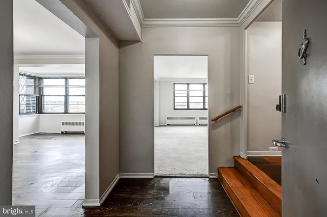 a view of an empty room and window