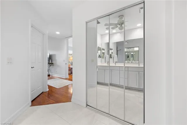 a bathroom with a tub and shower