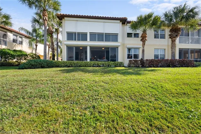 a view of a building with a yard