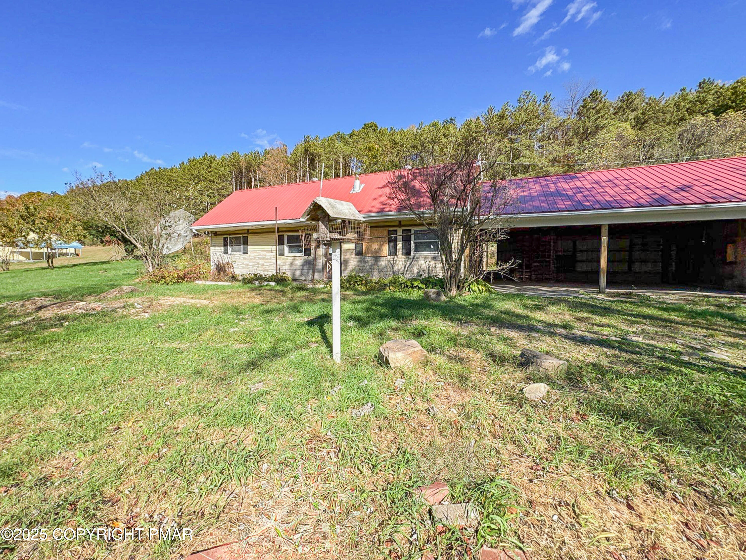 1162 Cemetery Road Muncy, PA 17756 - Photo 2 of 36 a view of a house with backyard porch and sitting area