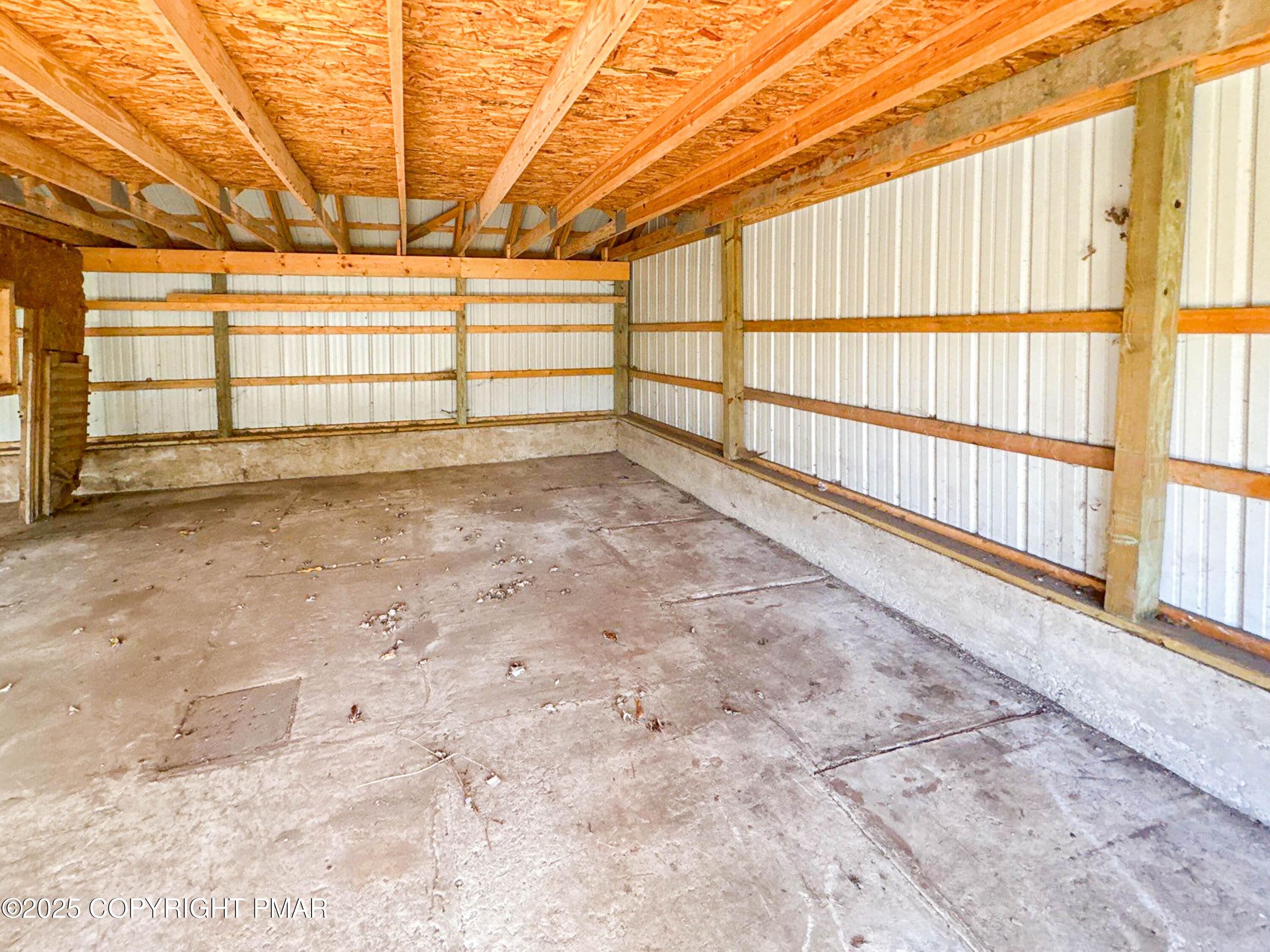 1162 Cemetery Road Muncy, PA 17756 - Photo 31 of 36 a view of a room with racks on the wall