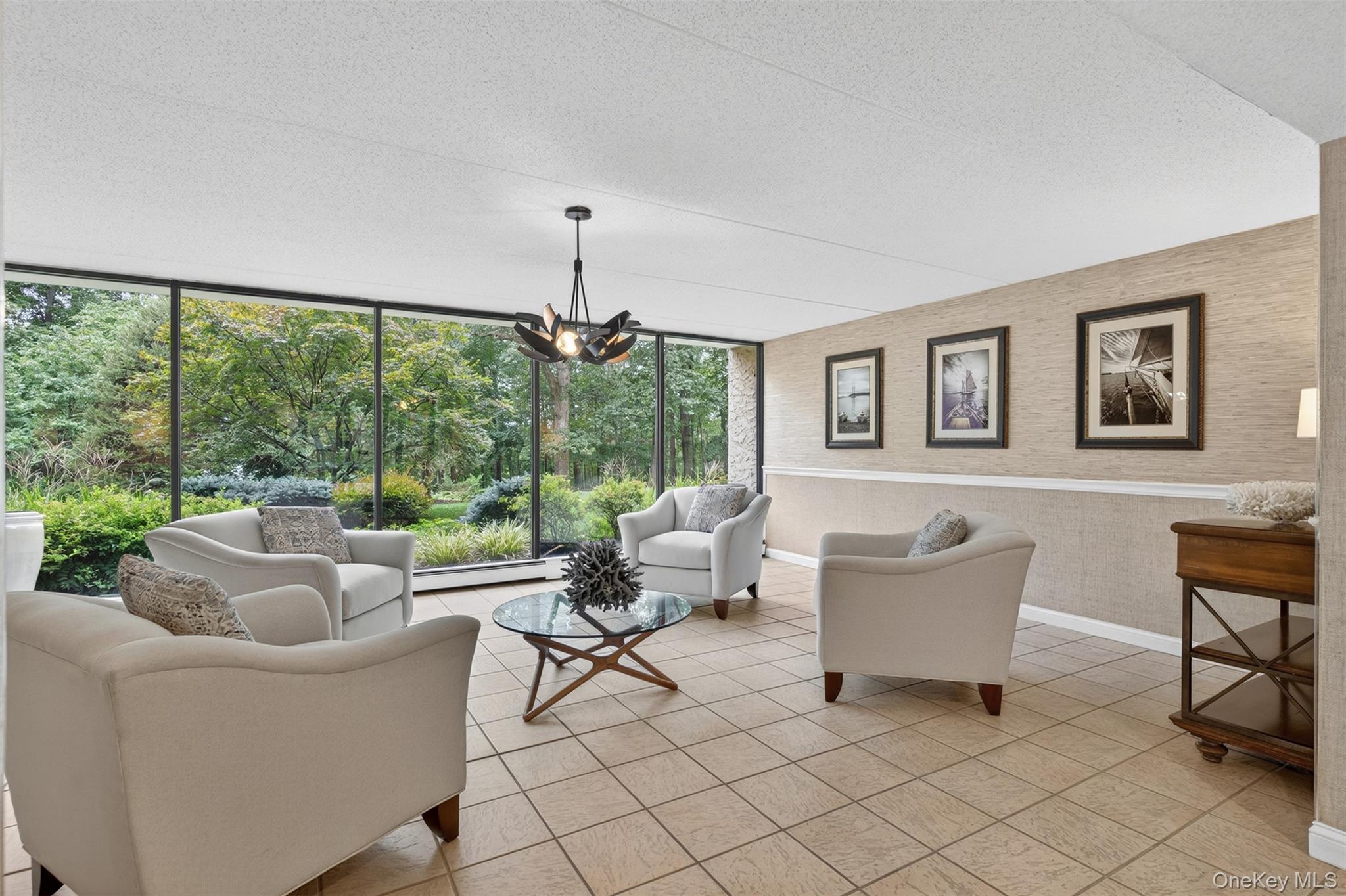 150 Overlook Avenue, Unit 7F Peekskill, NY 10566 - Photo 16 of 24 a living room with furniture and a large window
