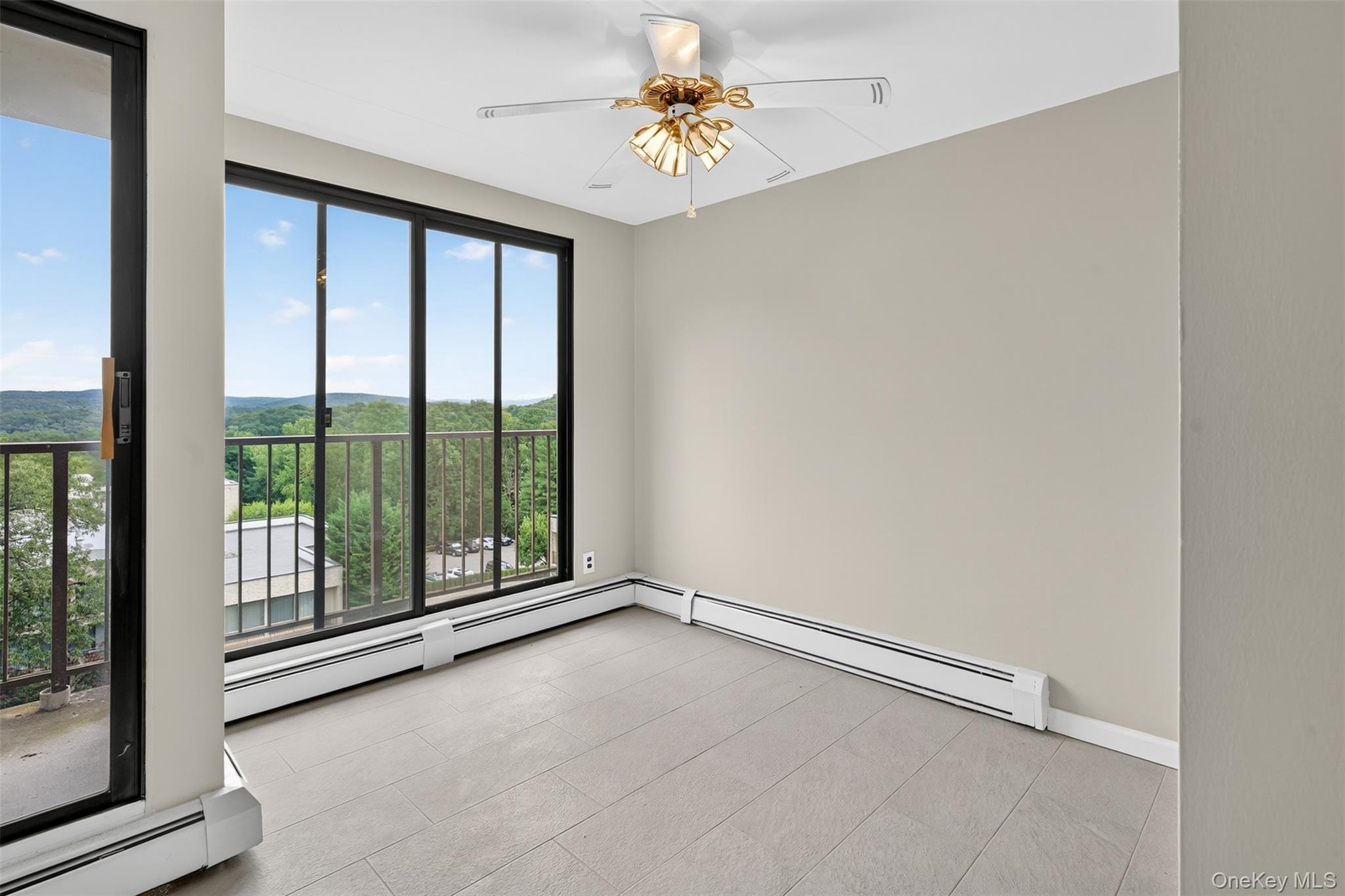 150 Overlook Avenue, Unit 7F Peekskill, NY 10566 - Photo 5 of 24 a view of an empty room with a window