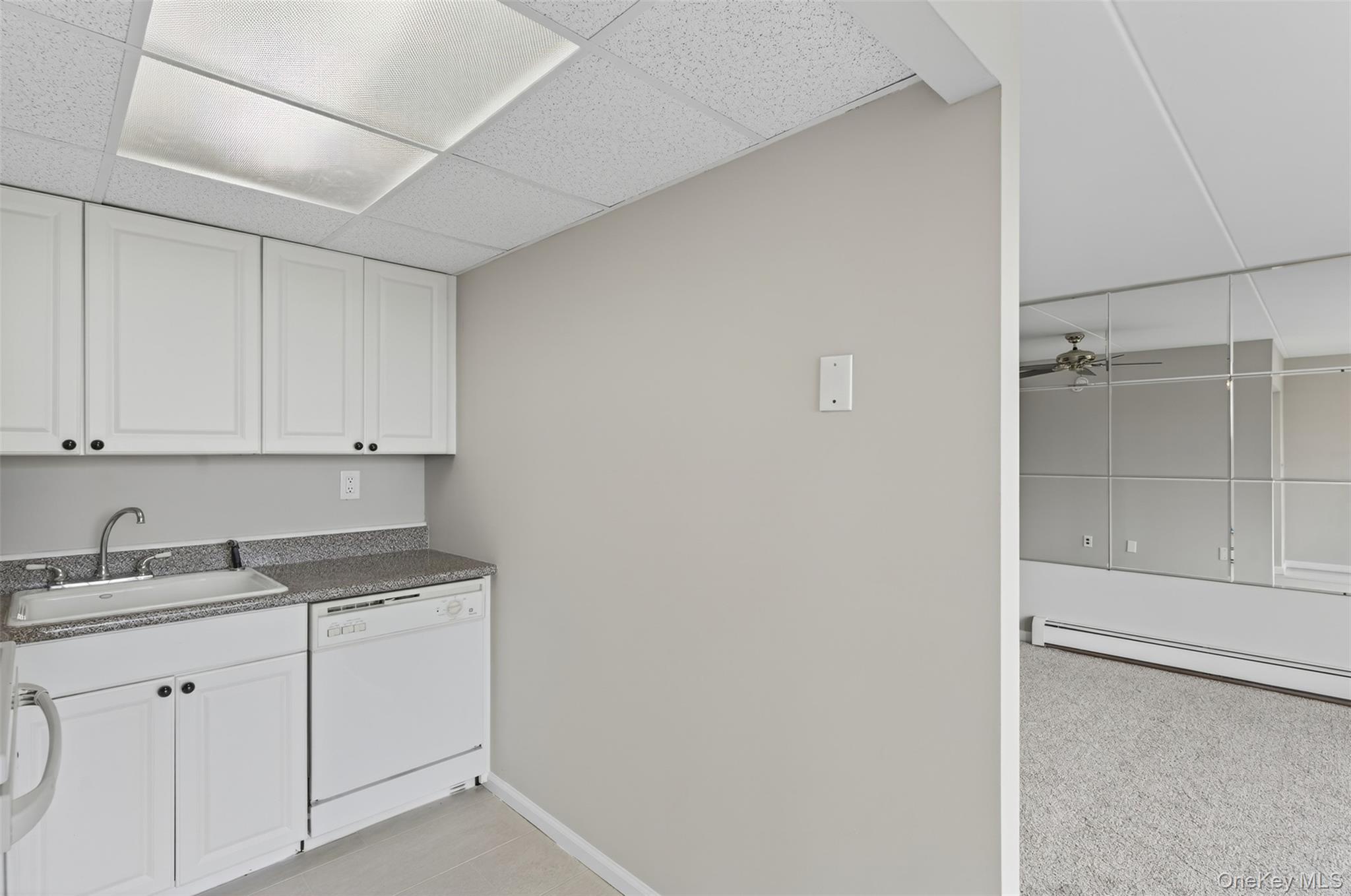 150 Overlook Avenue, Unit 7F Peekskill, NY 10566 - Photo 10 of 24 a kitchen with a sink and cabinets