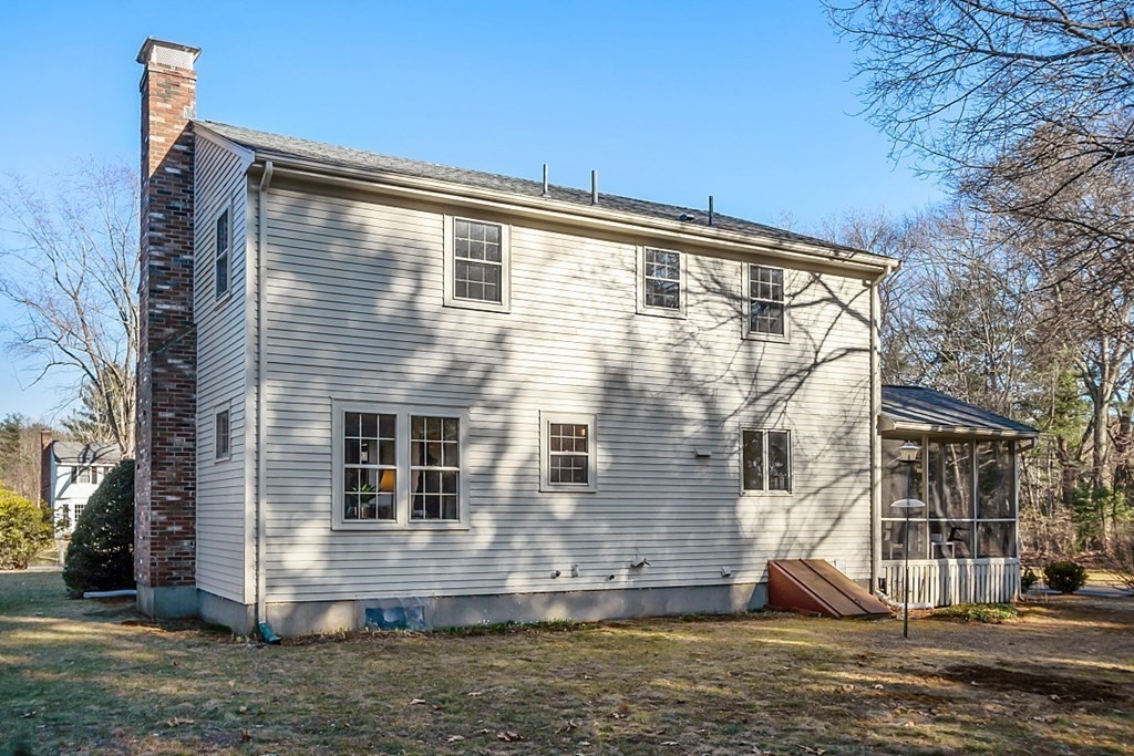31 Ward Road Sudbury, MA 01776 - Photo 2 of 26 a view of a house with a yard