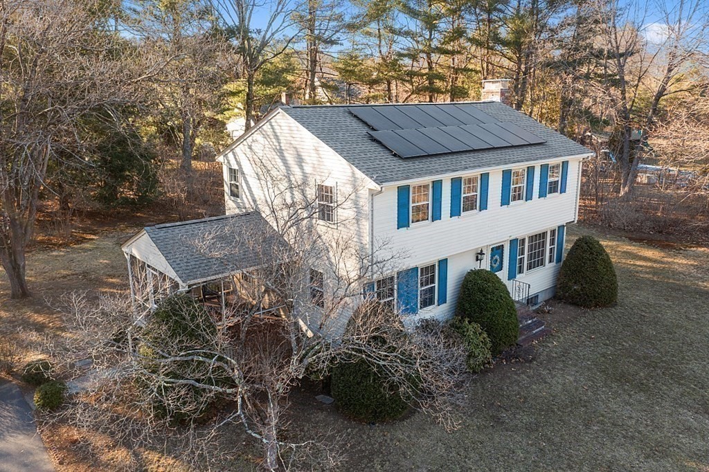 31 Ward Road Sudbury, MA 01776 - Photo 24 of 26 a view of a house with backyard and sitting area