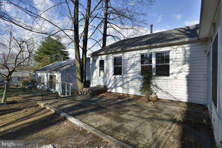 3816 Littleton Street Silver Spring, MD 20906 - Photo 20 of 21 a front view of a house with a yard