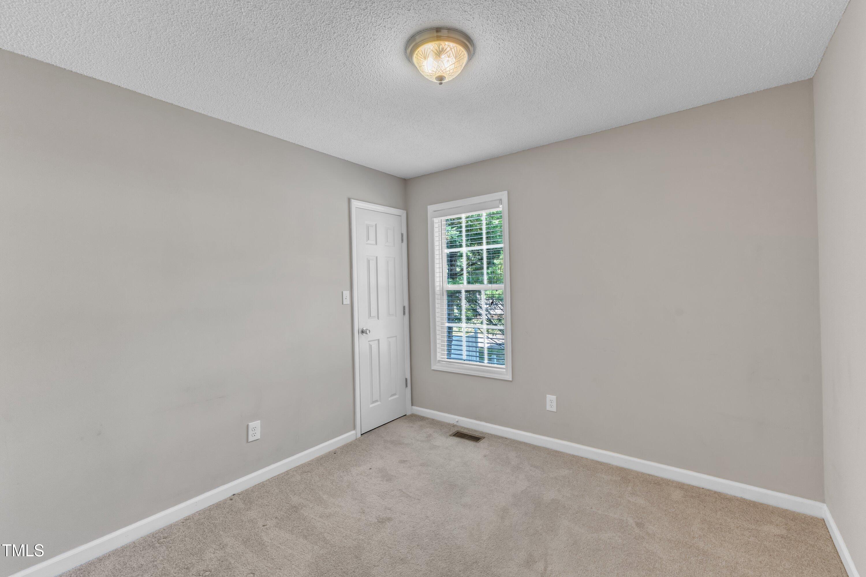 4533 Whistling Way Raleigh, NC 27616 - Photo 15 of 25 Another Spacious secondary bedroom with walk in closet!
