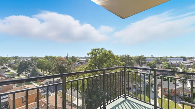 a view of a city skyline from a balcony