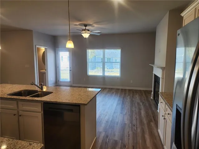 a kitchen with a stove and a microwave