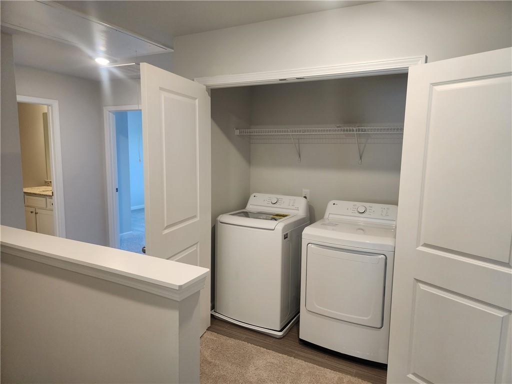 832 Cygnet Lane Grayson, GA 30017 - Photo 24 of 35 a utility room with dryer and washer