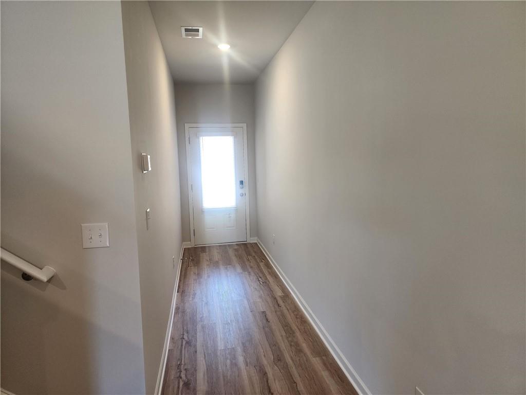 832 Cygnet Lane Grayson, GA 30017 - Photo 4 of 35 a view of hallway with wooden floor