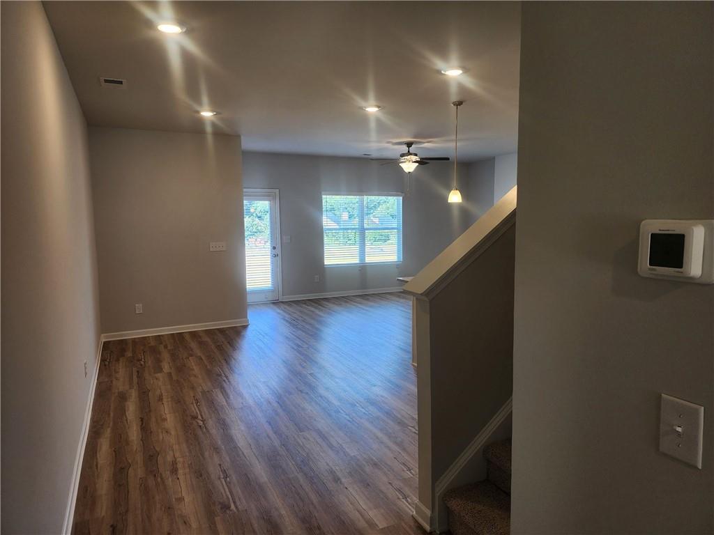 832 Cygnet Lane Grayson, GA 30017 - Photo 6 of 35 a view of empty room with wooden floor