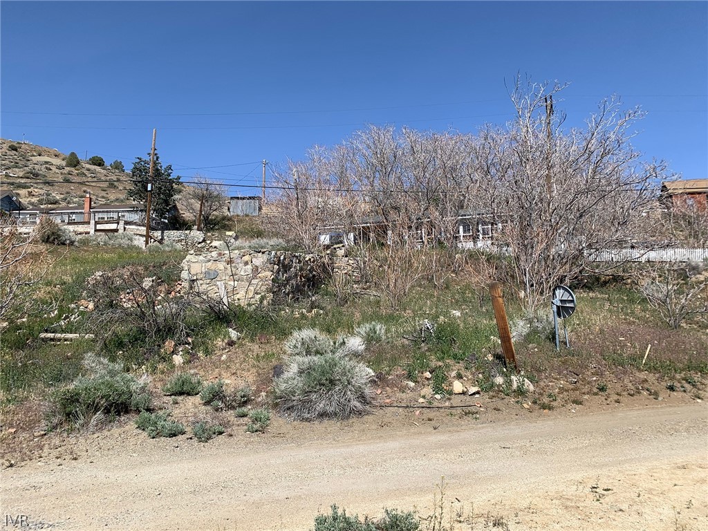 75 Main Street Silver City, NV 89428 - Photo 4 of 23 a view of a yard covered with snow