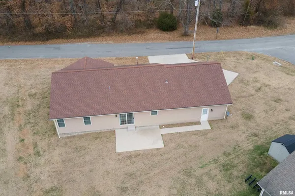 a view of house with outdoor space