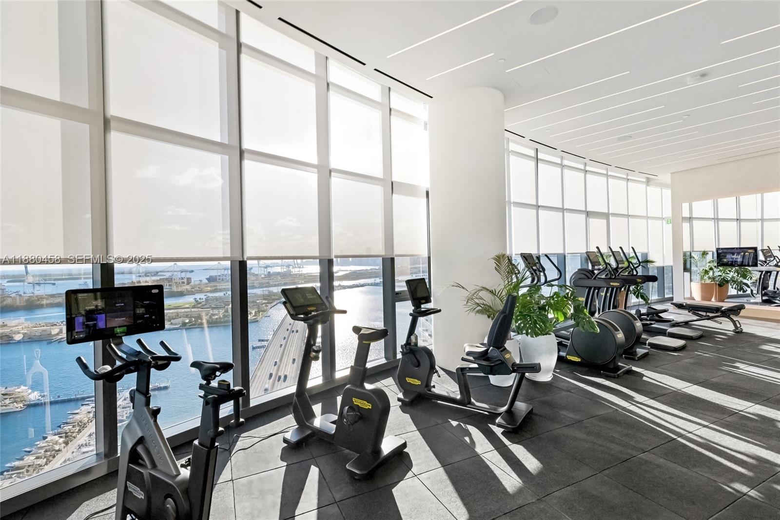 500 Alton Road, Unit 2802 Miami Beach, FL 33139 - Photo 22 of 51 a view of a room with gym equipment