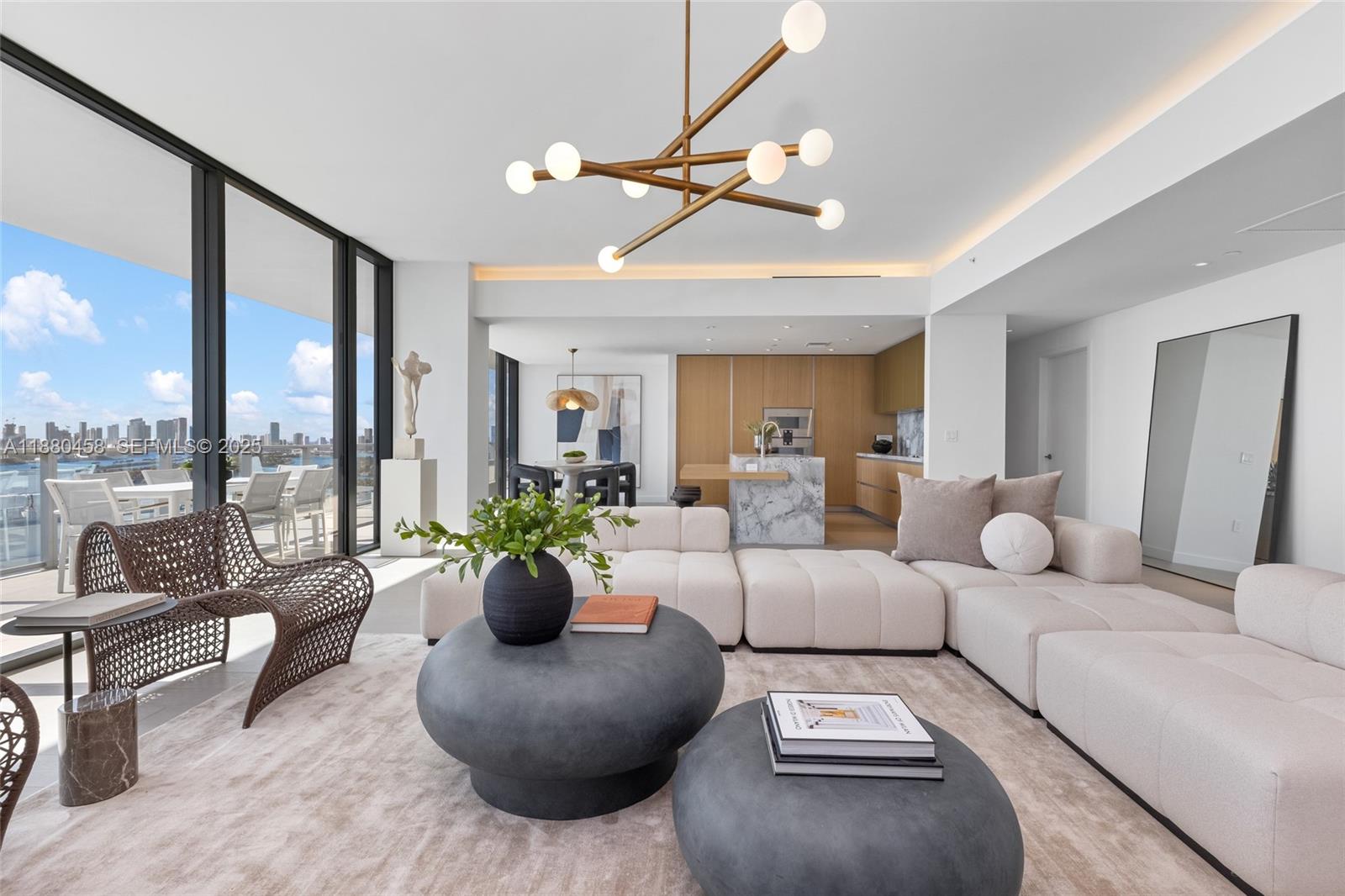 500 Alton Road, Unit 2802 Miami Beach, FL 33139 - Photo 5 of 51 a living room with furniture and a large window