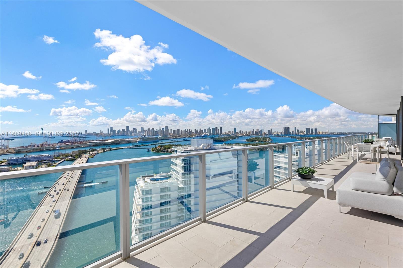 500 Alton Road, Unit 2802 Miami Beach, FL 33139 - Photo 6 of 51 a view of a balcony with city view