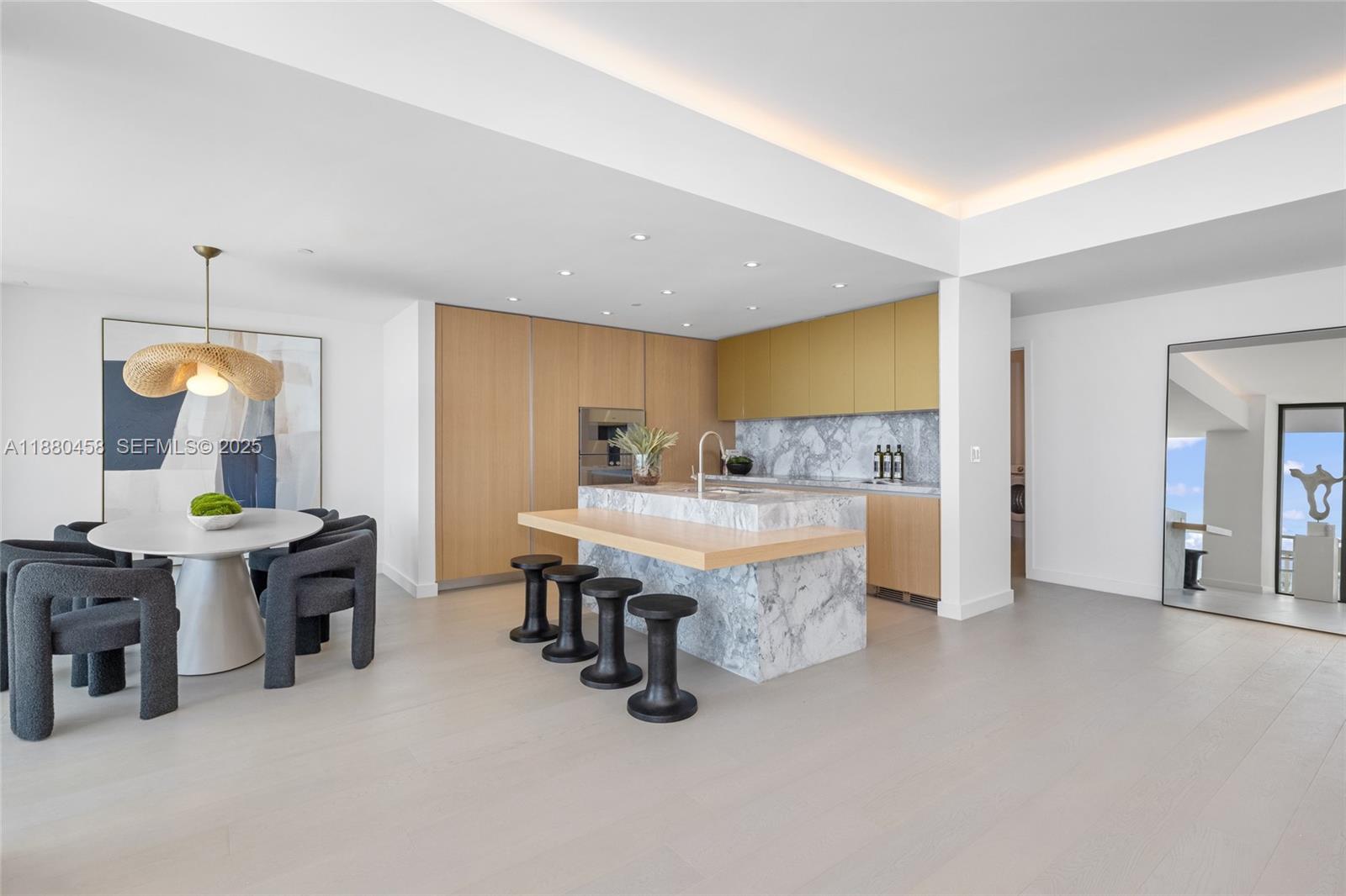 500 Alton Road, Unit 2802 Miami Beach, FL 33139 - Photo 8 of 51 a large living room with furniture