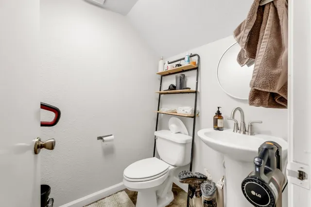 a bathroom with a sink and a toilet