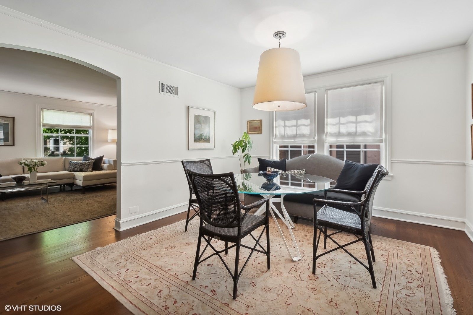 2044 Ewing Avenue Evanston, IL 60201 - Photo 11 of 35 a view of a dining room with furniture window and wooden floor