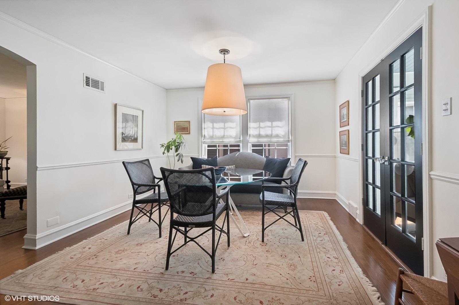 2044 Ewing Avenue Evanston, IL 60201 - Photo 12 of 35 a view of a dining room with furniture window and wooden floor