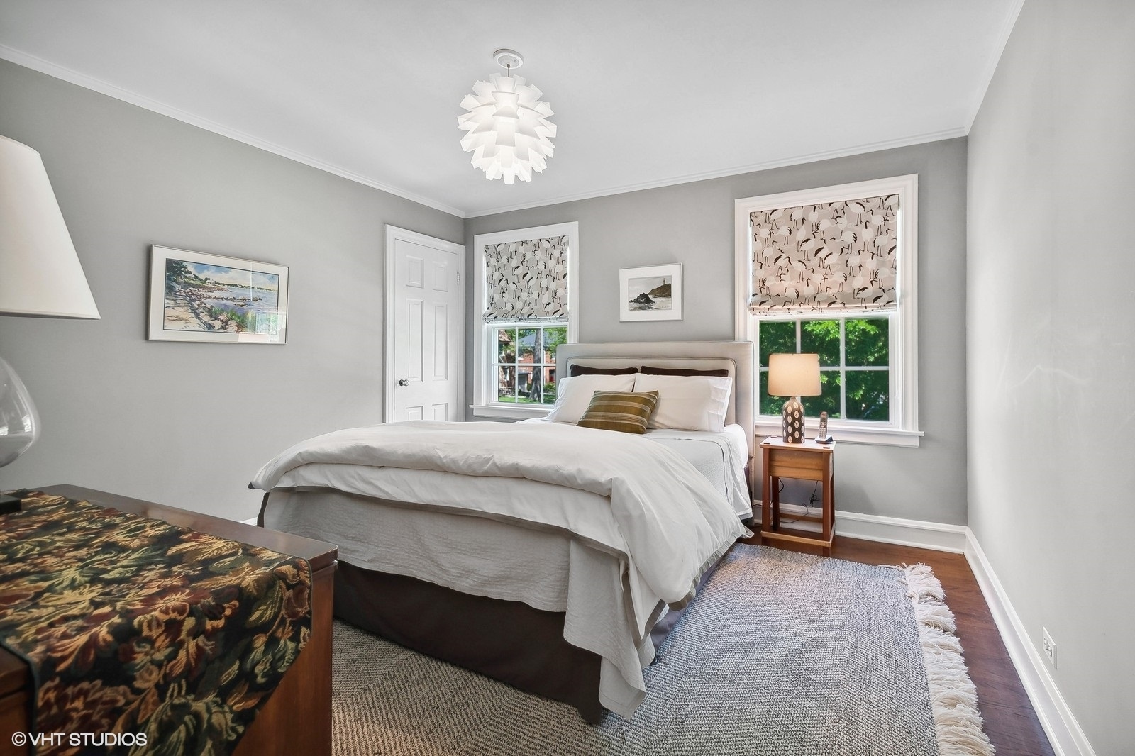 2044 Ewing Avenue Evanston, IL 60201 - Photo 22 of 35 a bedroom with a bed and a window