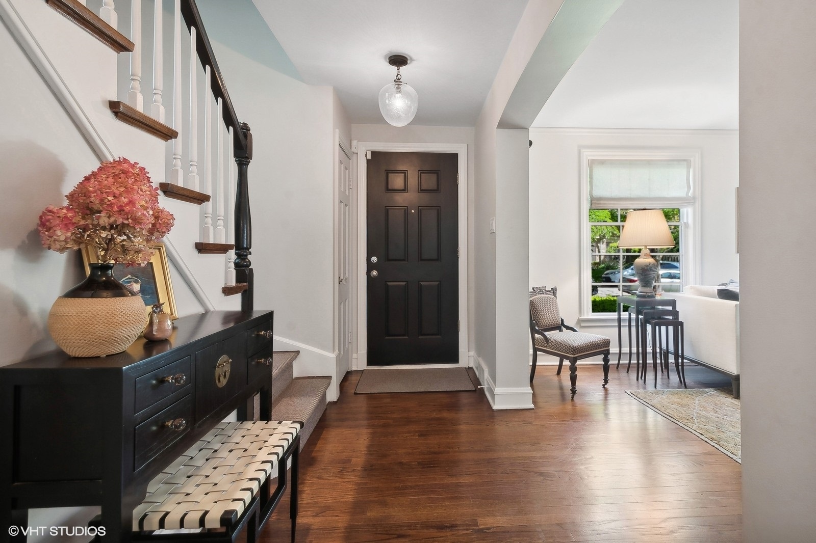2044 Ewing Avenue Evanston, IL 60201 - Photo 3 of 35 a room with furniture and wooden floor