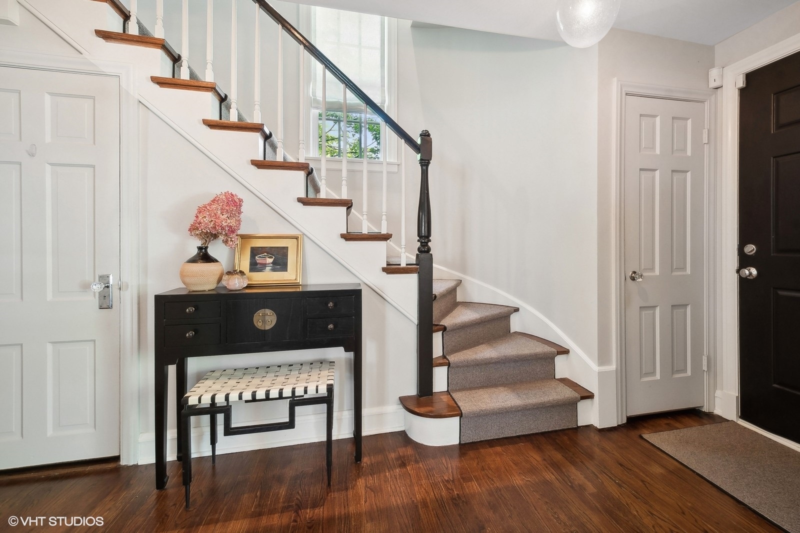 2044 Ewing Avenue Evanston, IL 60201 - Photo 4 of 35 a view of entryway livingroom and hall with wooden floor