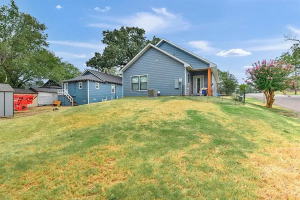 a house view with a outdoor space