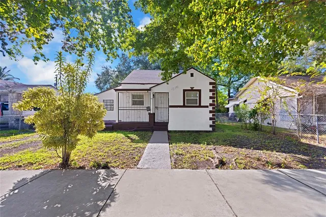 front view of a house with a yard
