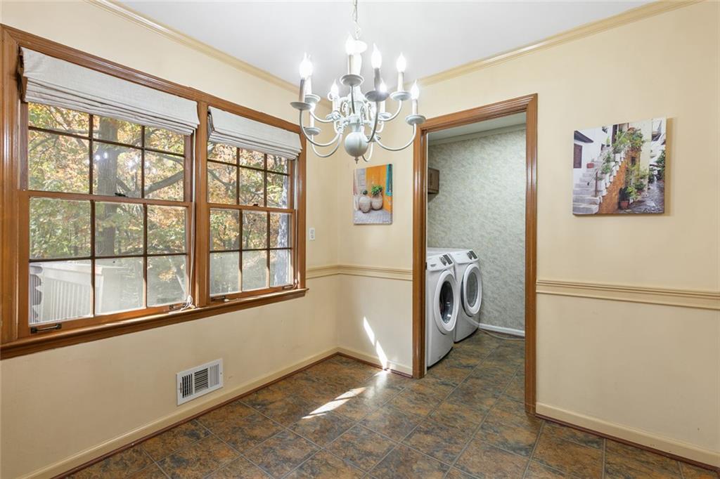 2258 Greencrest Drive Northeast Atlanta, GA 30345 - Photo 11 of 39 a view of a storage and utility room with windows