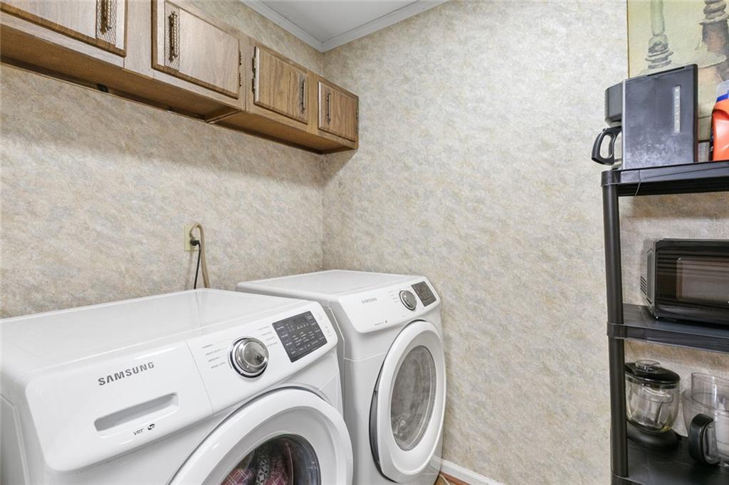 2258 Greencrest Drive Northeast Atlanta, GA 30345 - Photo 12 of 39 a utility room with dryer and washer