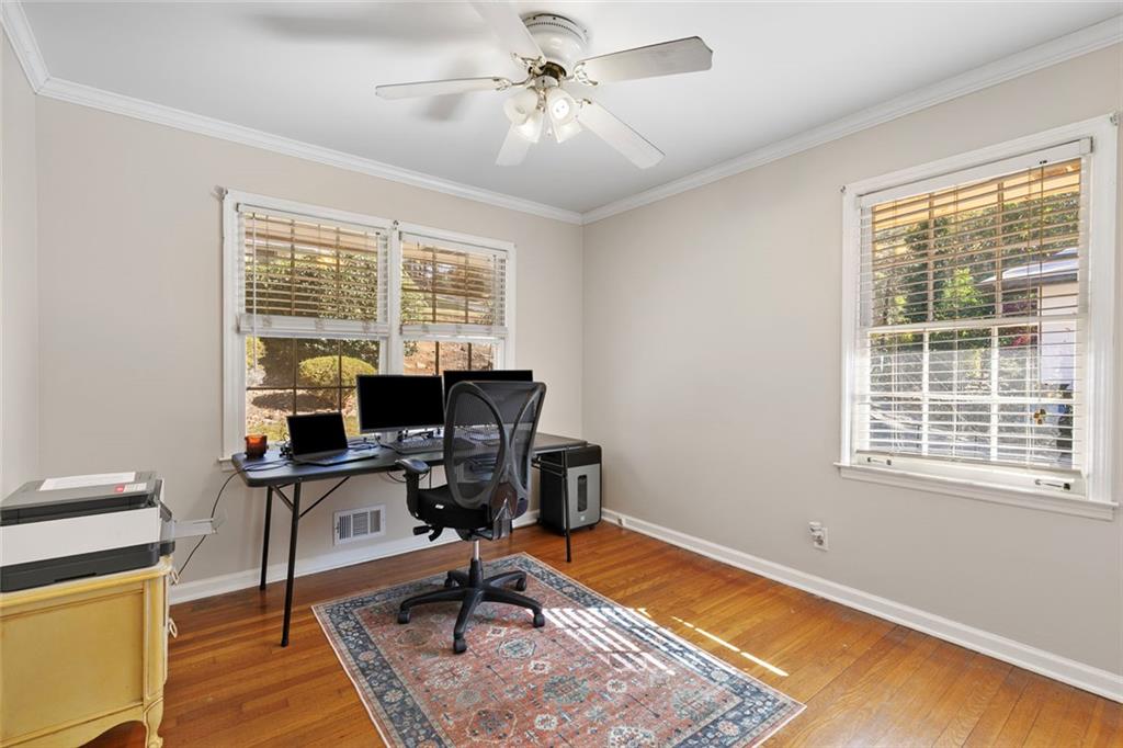 2258 Greencrest Drive Northeast Atlanta, GA 30345 - Photo 23 of 39 a view of a workspace with furniture and a window