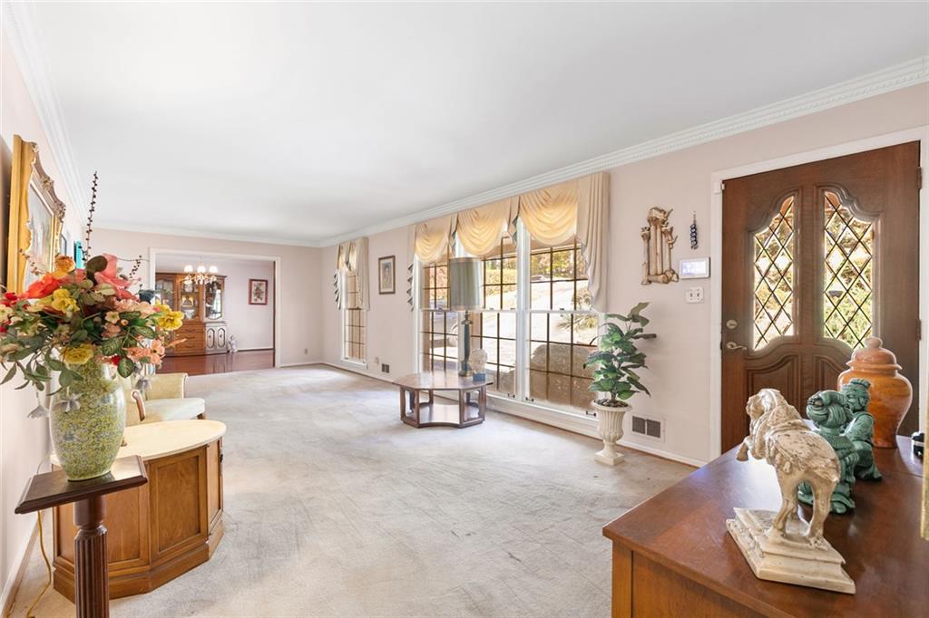 2258 Greencrest Drive Northeast Atlanta, GA 30345 - Photo 3 of 39 a living room with furniture and a large window